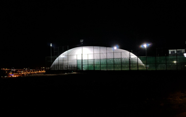 indoor football field amman night